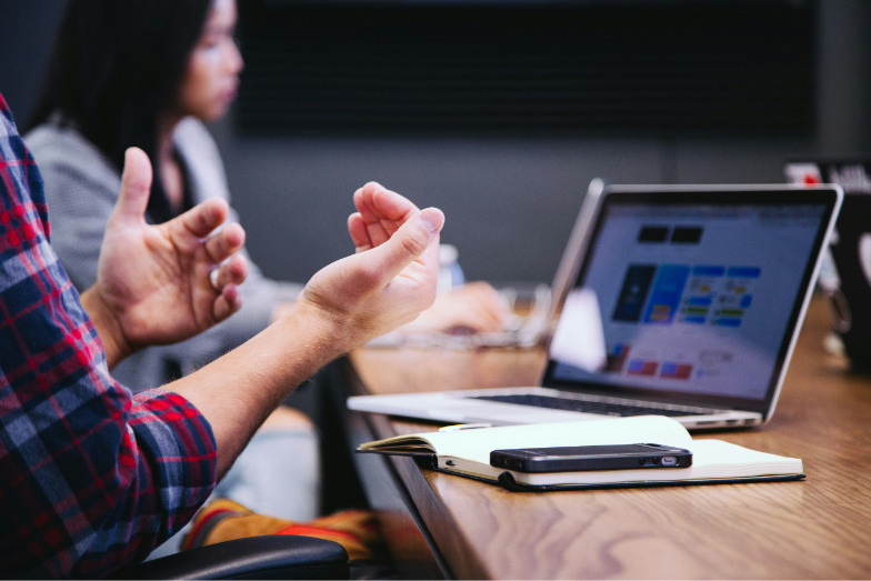 Diverse team conducting AI Readiness Assessment in modern office setting